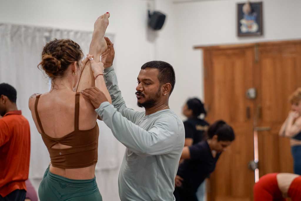 Mysore-style practice with teacher demonstration